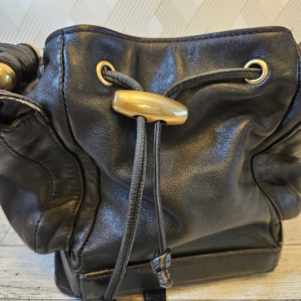Sabina Black Leather Drawstring Shoulder Bag with Gold Accents - Picture 5 of 16
